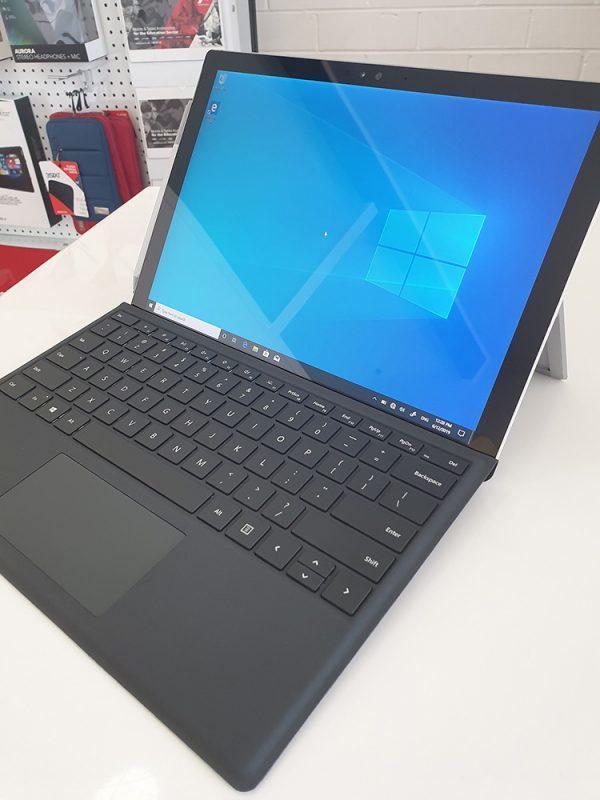 Refurbished Microsoft Surface Pro 4 with black keyboard