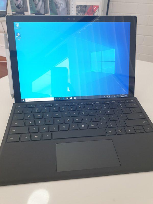 Refurbished Microsoft Surface Pro 4 with black keyboard front